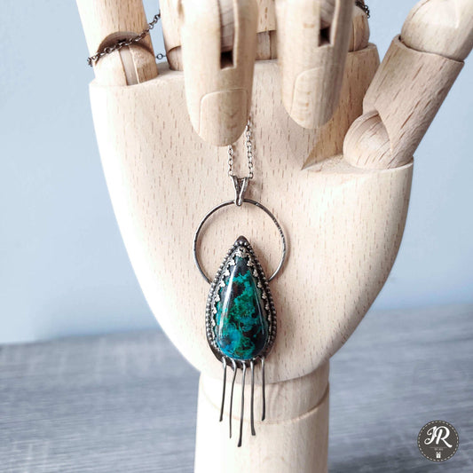 Handcrafted 925 sterling silver pendant featuring a vibrant drop-shaped Chrysocolla stone, accented with delicate silver fringe for playful movement and bohemian charm.