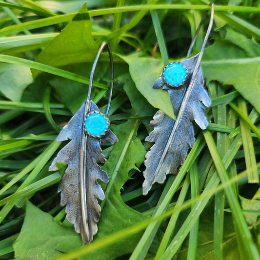 Opal Fern Leaf Earrings crafted from sterling silver, featuring delicate fern-shaped designs with lab-created opal accents